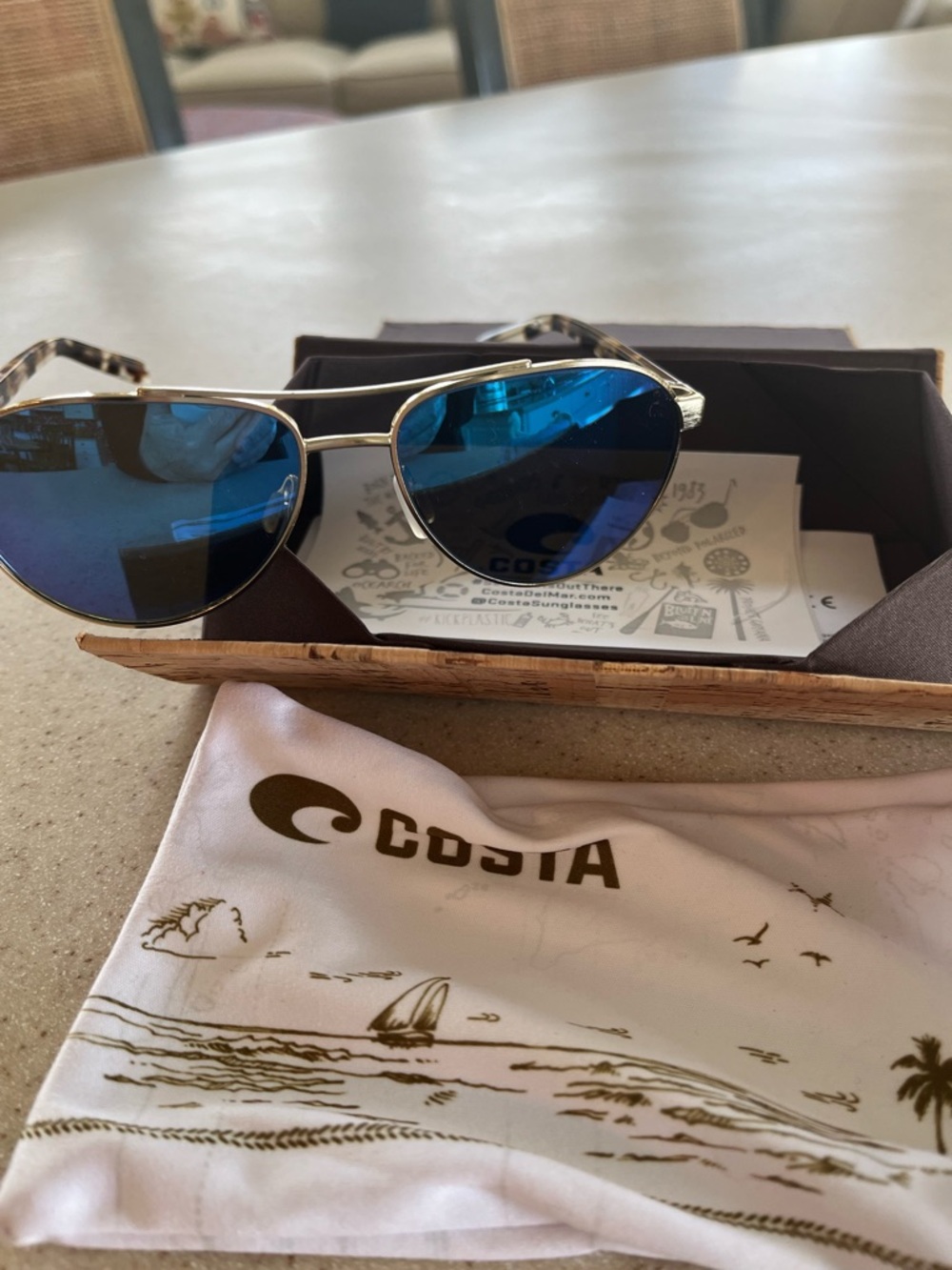 Costa Del Mar Silver Frame Sunglasses with Blue Mirrored Lenses